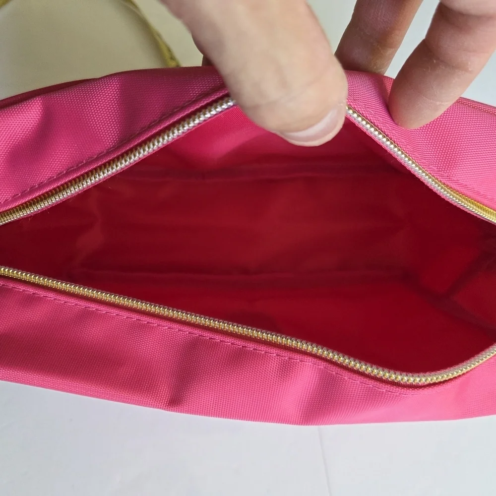 Pink Zipper Pouch with Embroidered Disney Design.